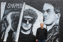 'Snapper' - a Dunedin band painted on the side of the Crown Hotel